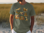 T-shirt with a collage of seven playful golden retriever puppies with yarn.