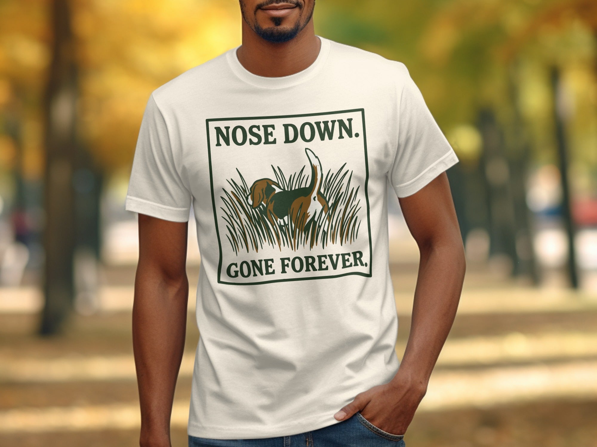 White t-shirt with "NOSE DOWN. GONE FOREVER." and a beagle in tall grass.