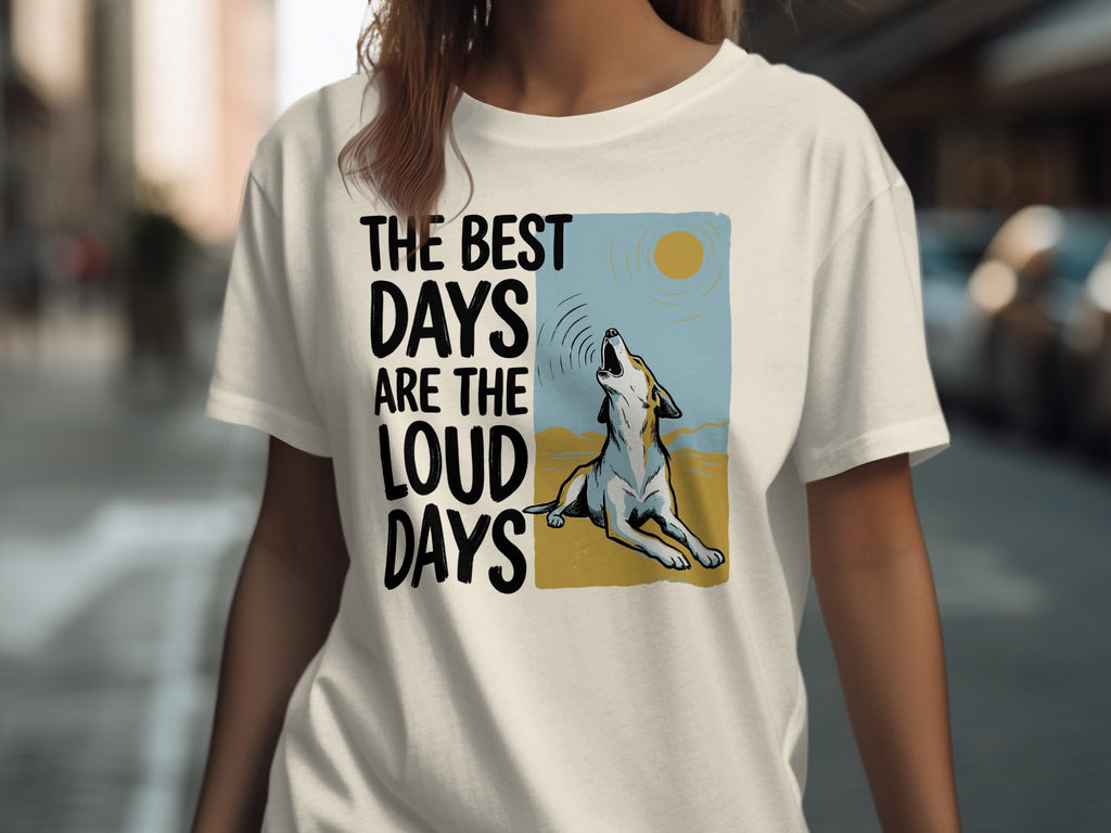 T-shirt with a wolf howling at the sun and text: THE BEST DAYS ARE THE LOUD DAYS.