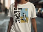 T-shirt with a wolf howling at the sun and text: THE BEST DAYS ARE THE LOUD DAYS.
