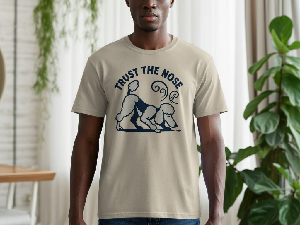 Tan t-shirt with a poodle graphic and the text "TRUST THE NOSE".