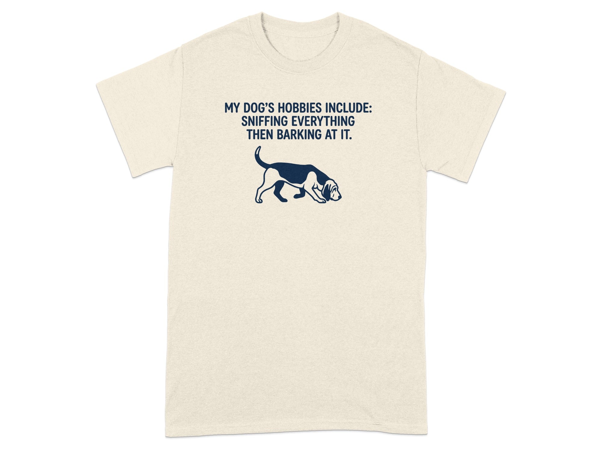 Cream t-shirt with dog illustration and "My Dog's Hobbies" text.