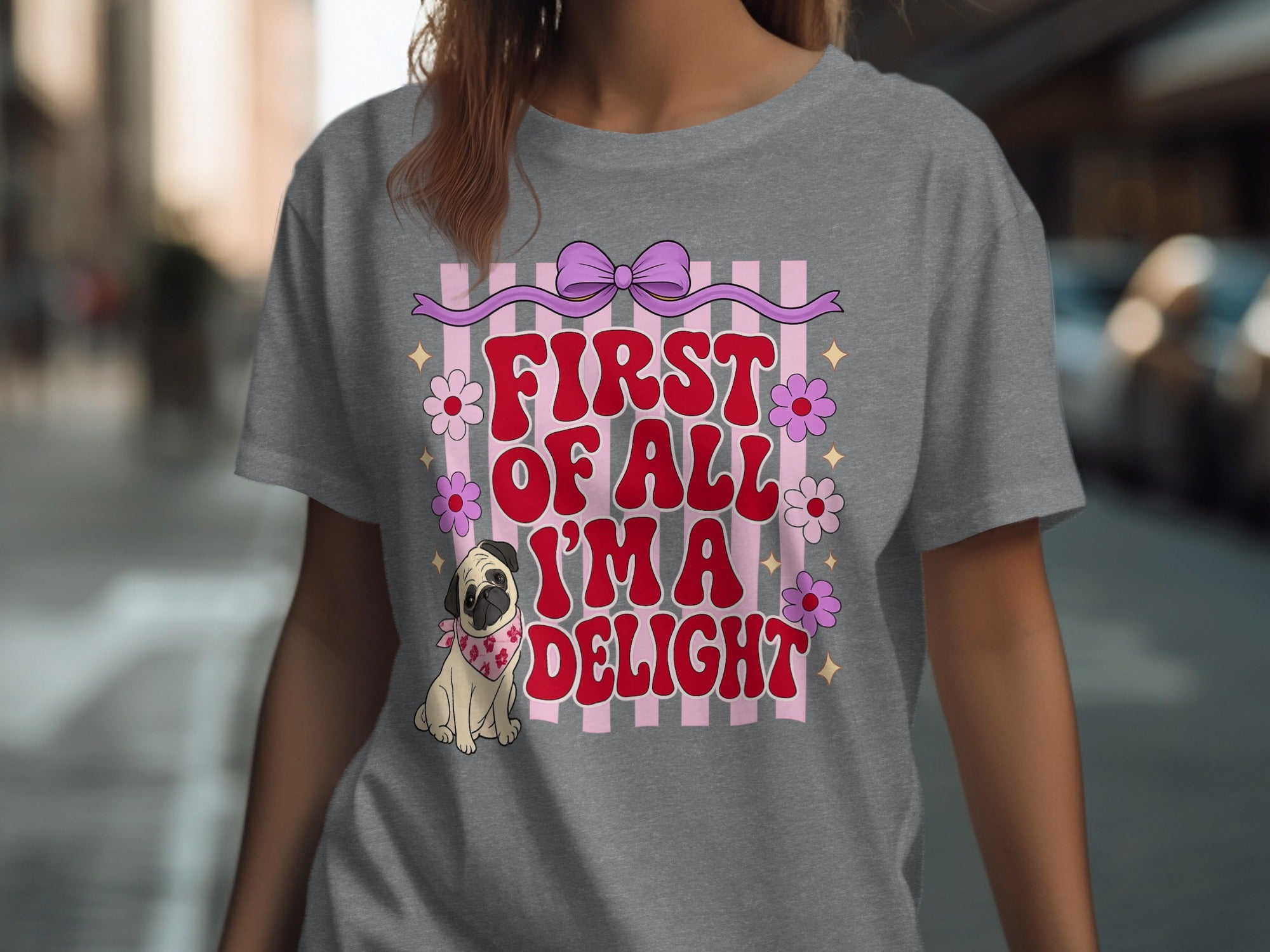 Gray t-shirt with pink text "First of all I'm a delight" and pug graphic.
