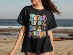 Black t-shirt with text "First of all, I'm a delight" and a dog.