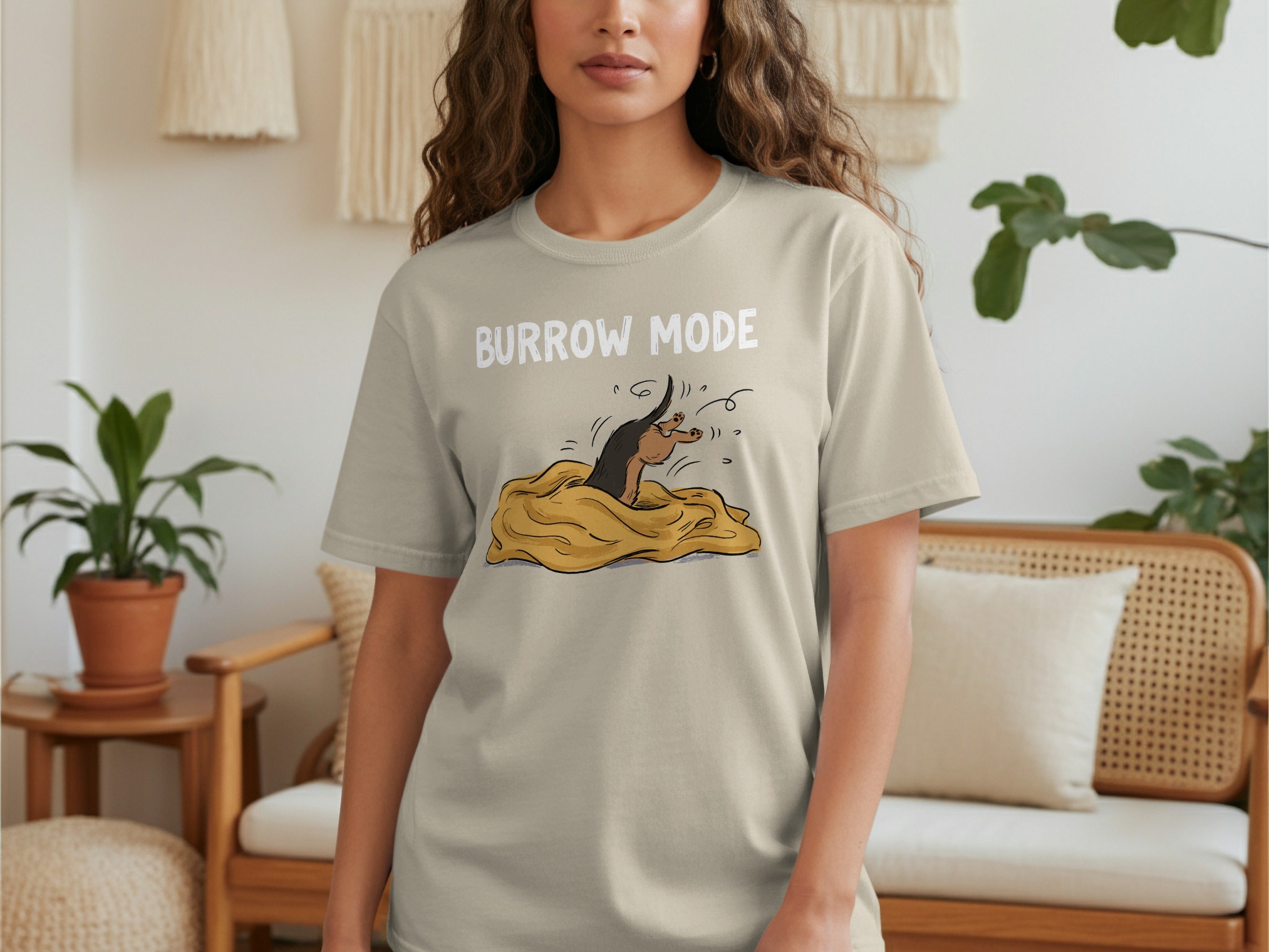 Dachshund emerging from a pile of blankets with "BURROW MODE" text.