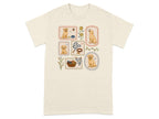 Framed illustrations of golden retrievers with toys, leash, and hearts on an off-white t-shirt.