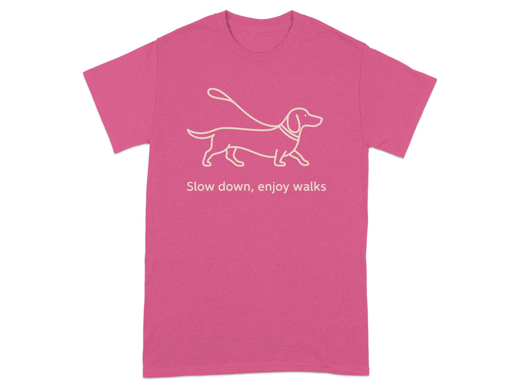 Dachshund on leash with text "Slow down, enjoy walks".