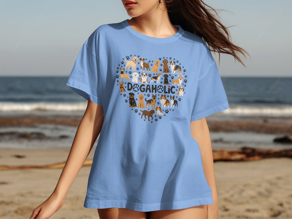 Light blue t-shirt with a heart-shaped collage of dogs and "DOGAHOLIC" text.