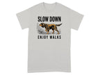 Grey t-shirt with a dog illustration and text "SLOW DOWN ENJOY WALKS".