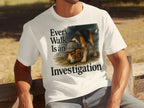 White t-shirt with beagle wearing a hat and text "Every Walk Is an Investigation".
