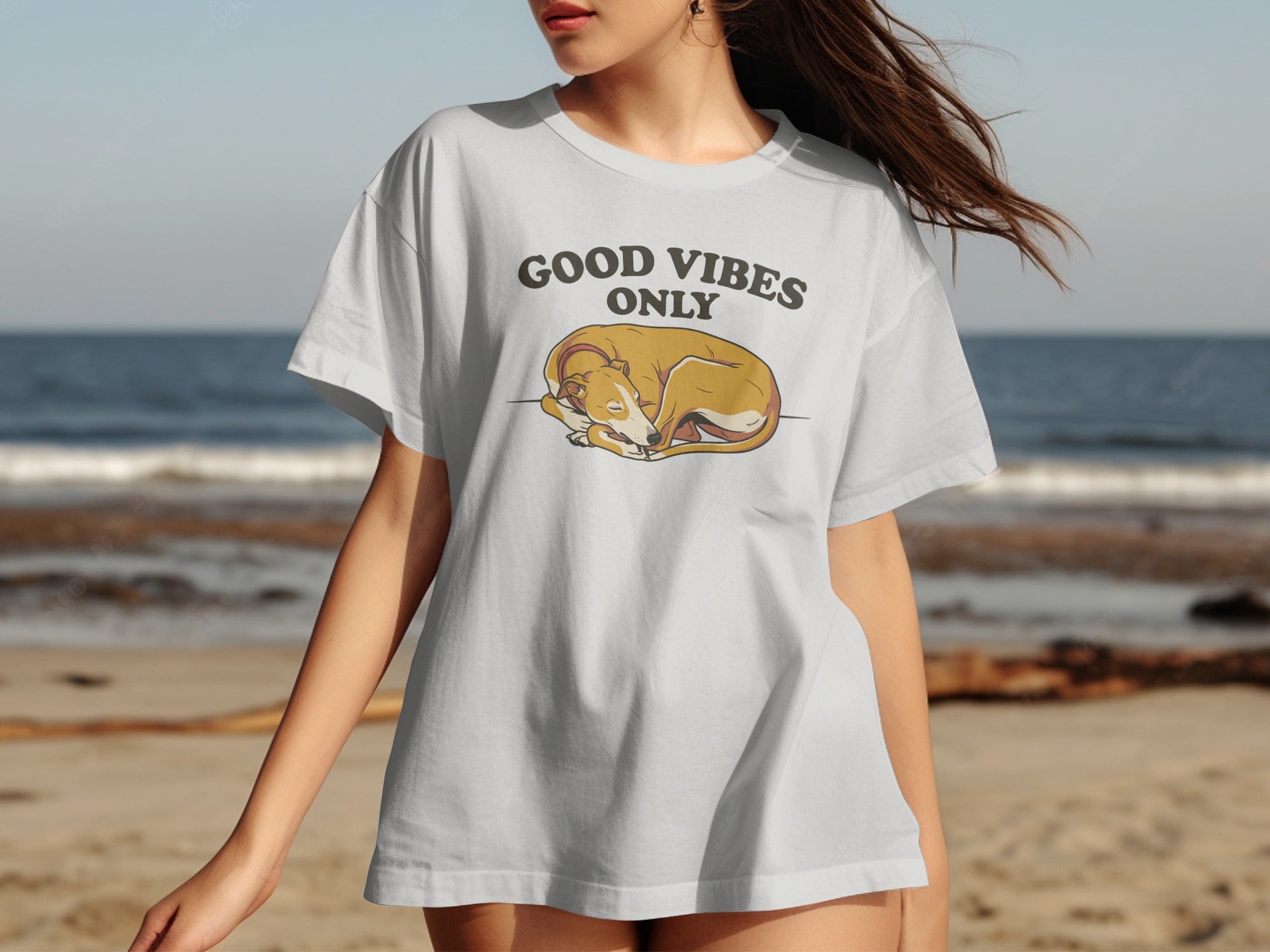 White t-shirt with "GOOD VIBES ONLY" and sleeping dog graphic.