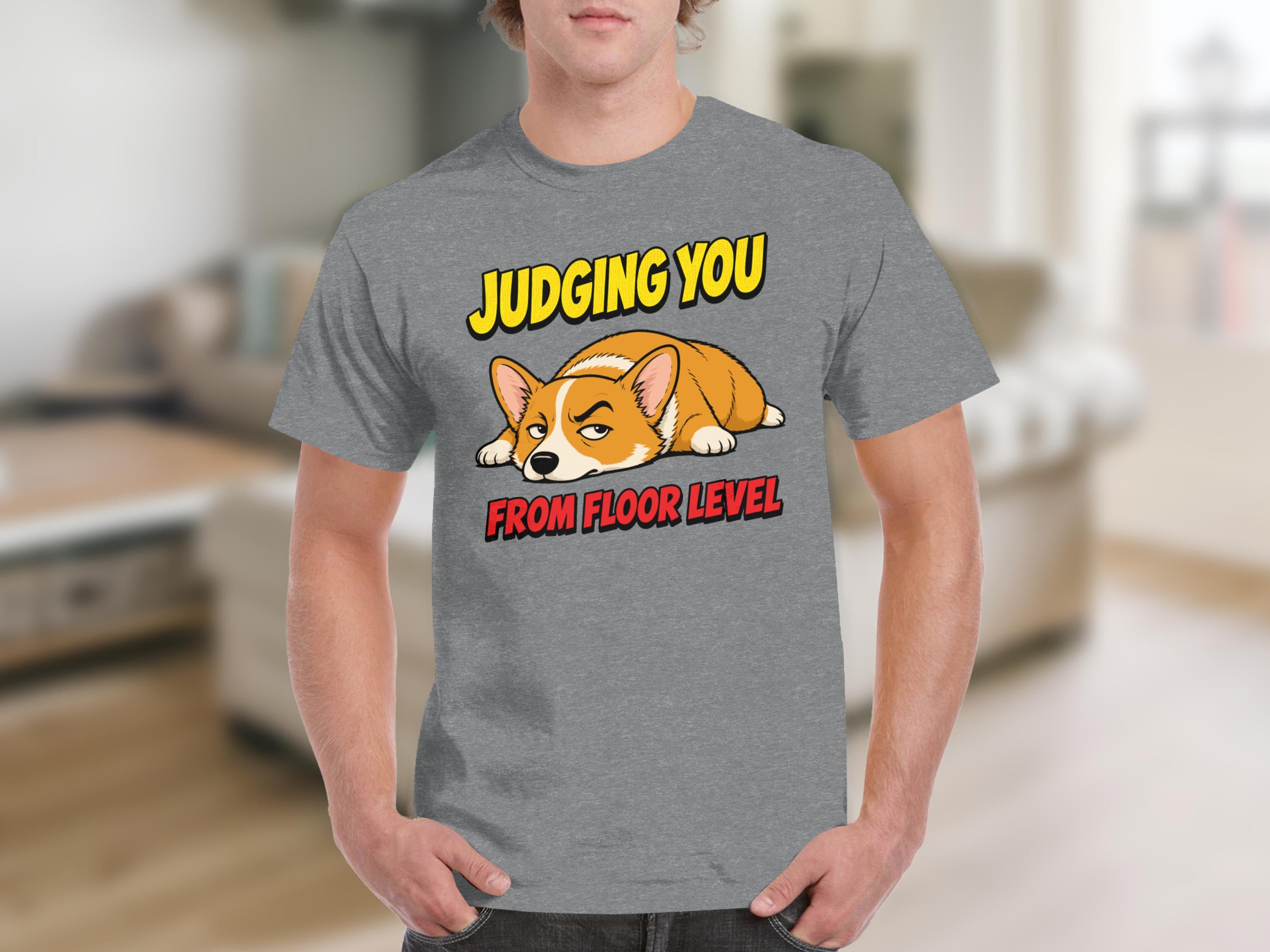 Grey t-shirt with text "JUDGING YOU FROM FLOOR LEVEL" and a corgi.