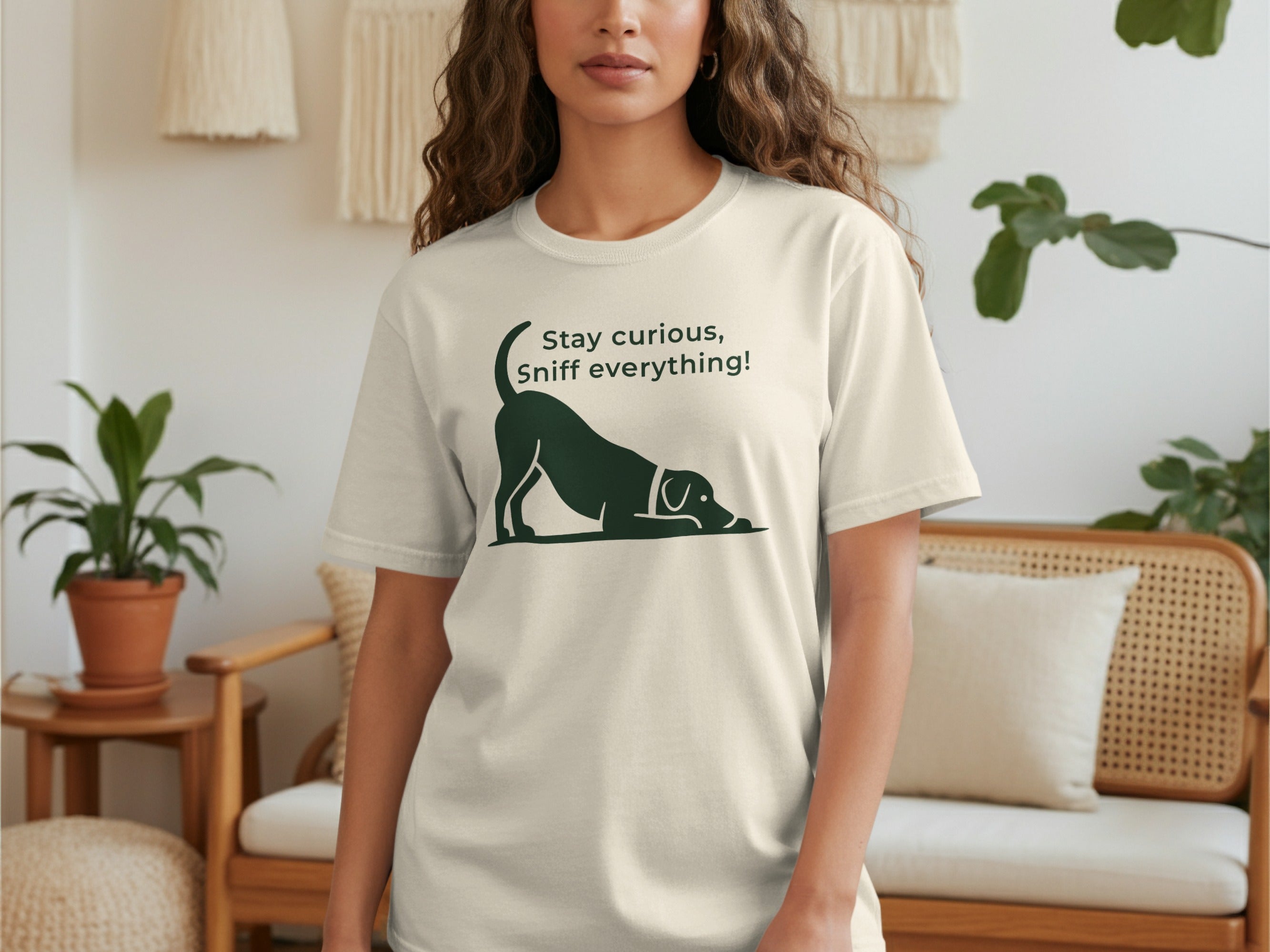 Cream t-shirt with dog graphic and text "Stay curious, Sniff everything!".