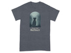 Dark grey t-shirt with dog sitting by water, text "Paws And Reflect".
