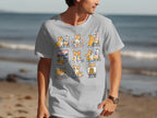 Grey t-shirt featuring montage of adorable corgis painting on easels.