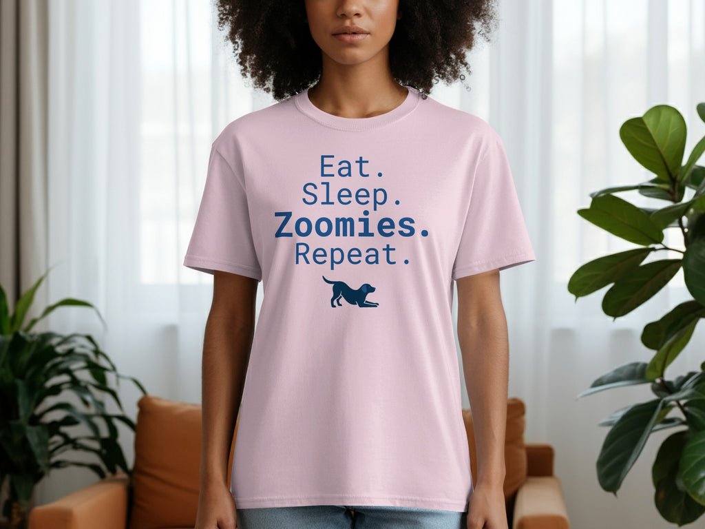 Pink t-shirt with "Eat. Sleep. Zoomies. Repeat." text and a dog silhouette.