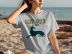 Grey t-shirt with "LUXURY ATHLETE AT REST" and a greyhound.