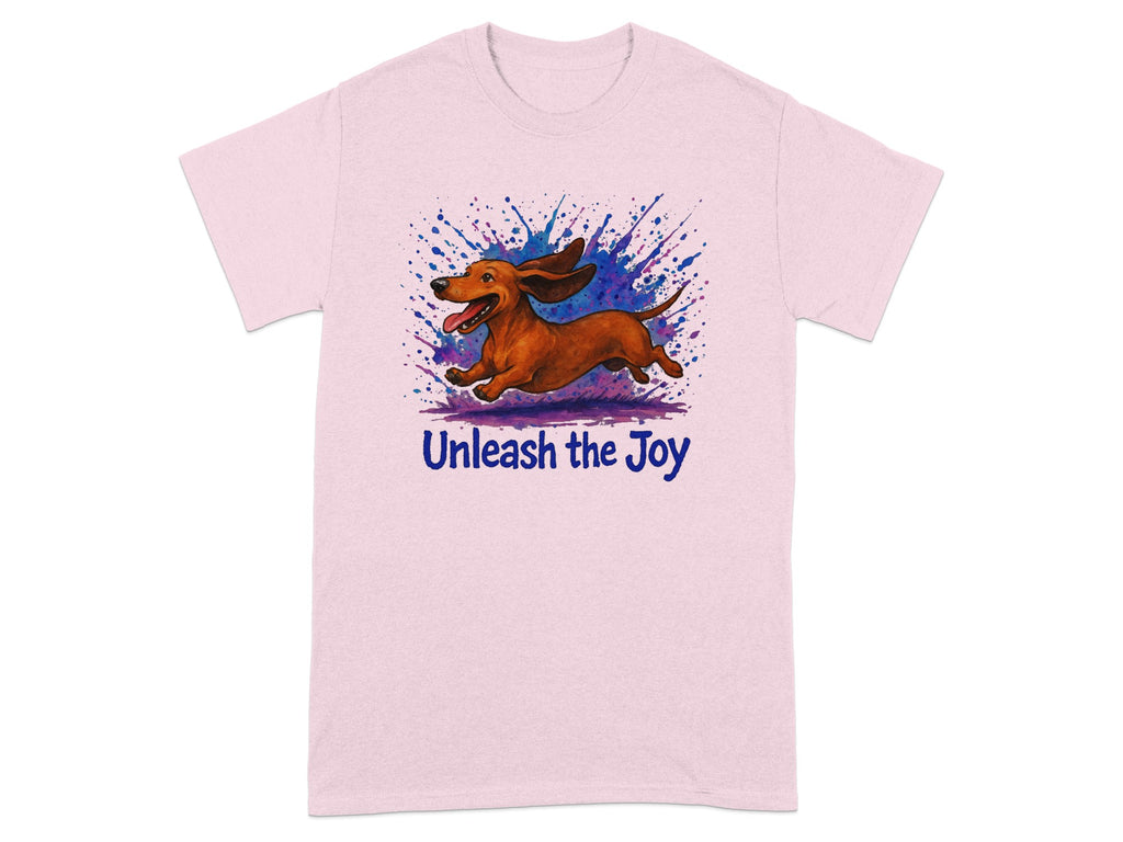 Pink t-shirt with a joyful dachshund running amidst a colorful paint splatter.