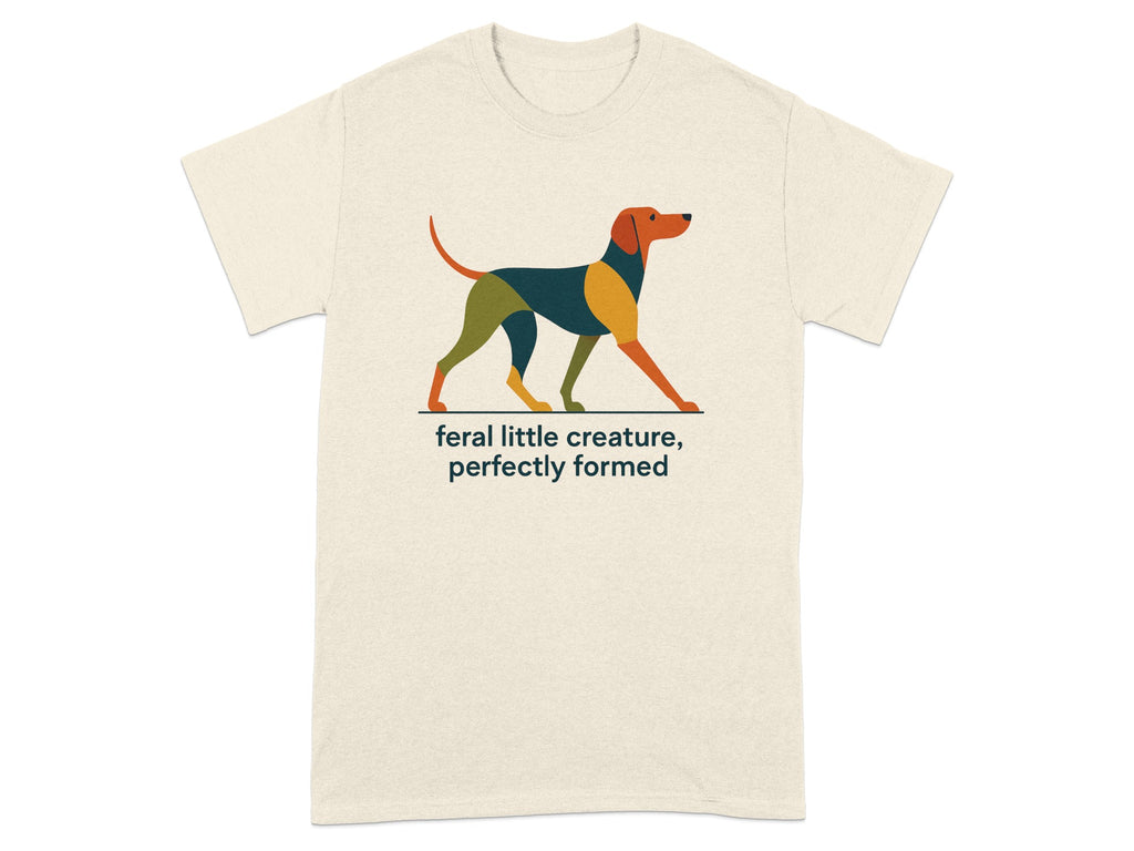 Cream t-shirt with abstract dog graphic and text "feral little creature, perfectly formed."