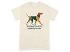 Cream t-shirt with abstract dog graphic and text "feral little creature, perfectly formed."