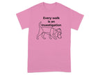 Pink t-shirt with a beagle wearing a detective hat and the text "Every walk is an investigation".