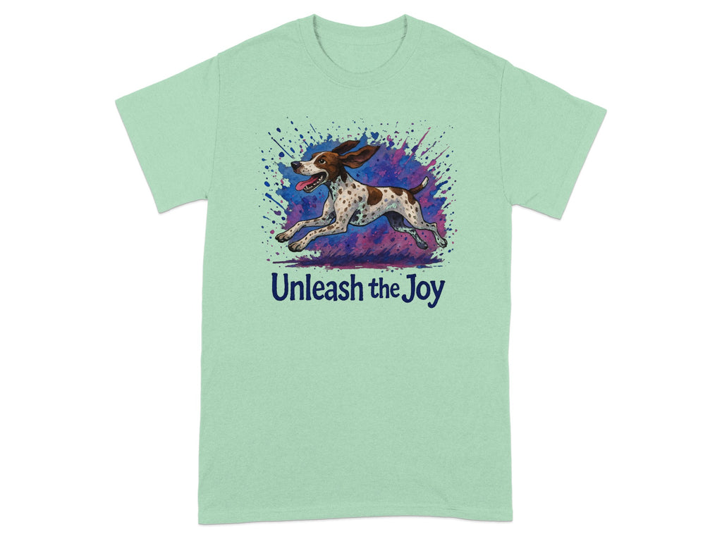 Pale green t-shirt with a running spotted dog and "Unleash the Joy" text.
