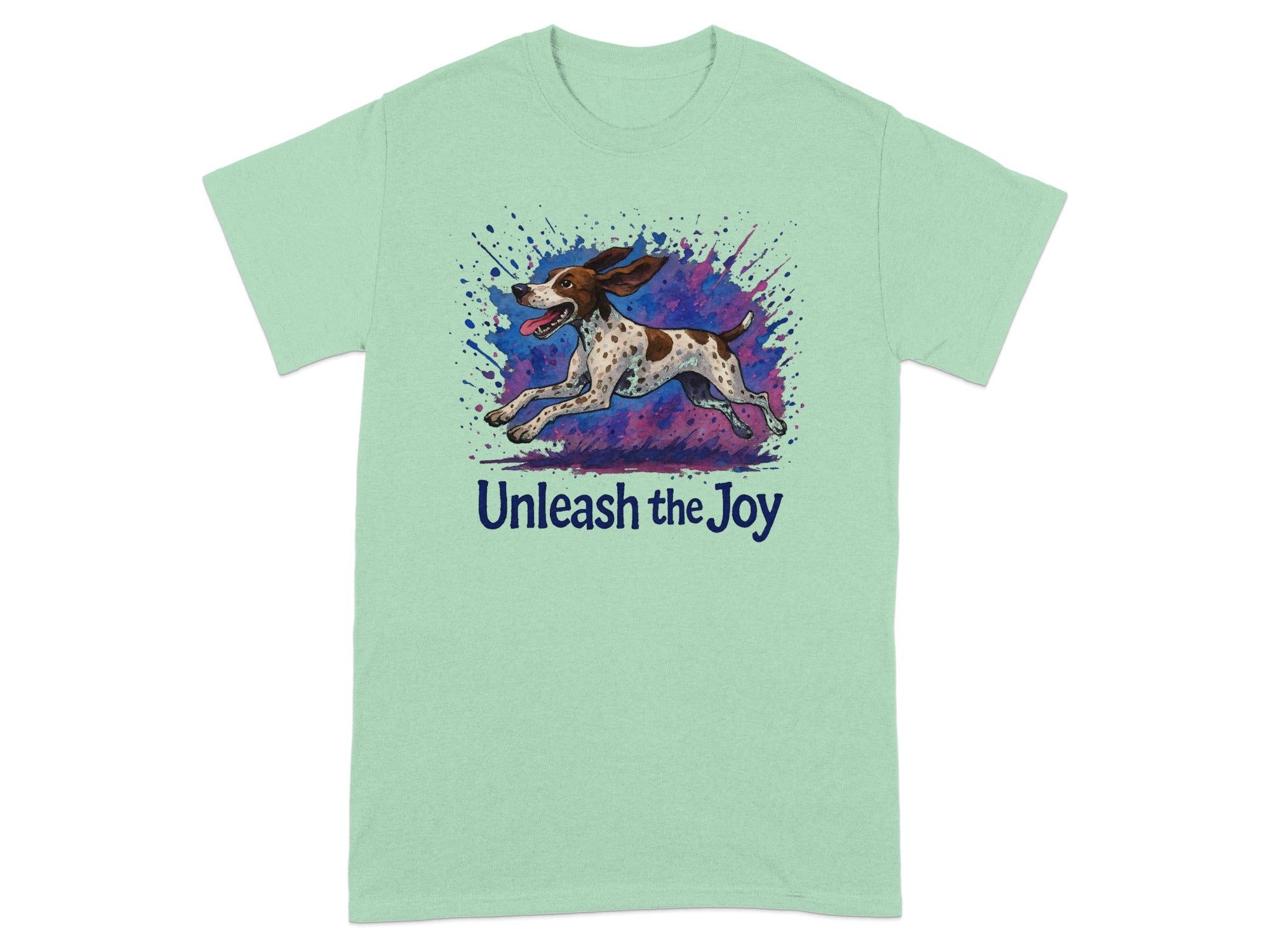 Pale green t-shirt with a running spotted dog and "Unleash the Joy" text.
