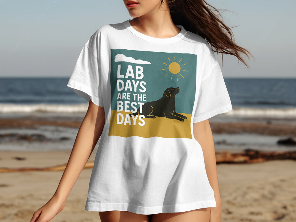 White t-shirt with graphic text "LAB DAYS ARE THE BEST DAYS" and a black lab on the beach.