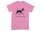 Pink t-shirt with a black outline of a Boston Terrier on a leash with text.