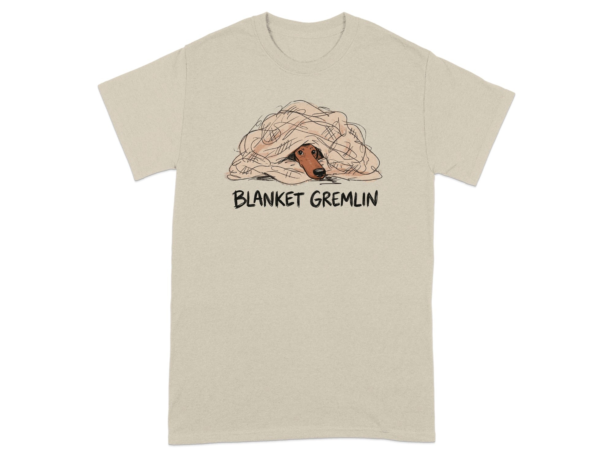 Beige t-shirt with "BLANKET GREMLIN" text and a dog's face peeking from under a blanket.