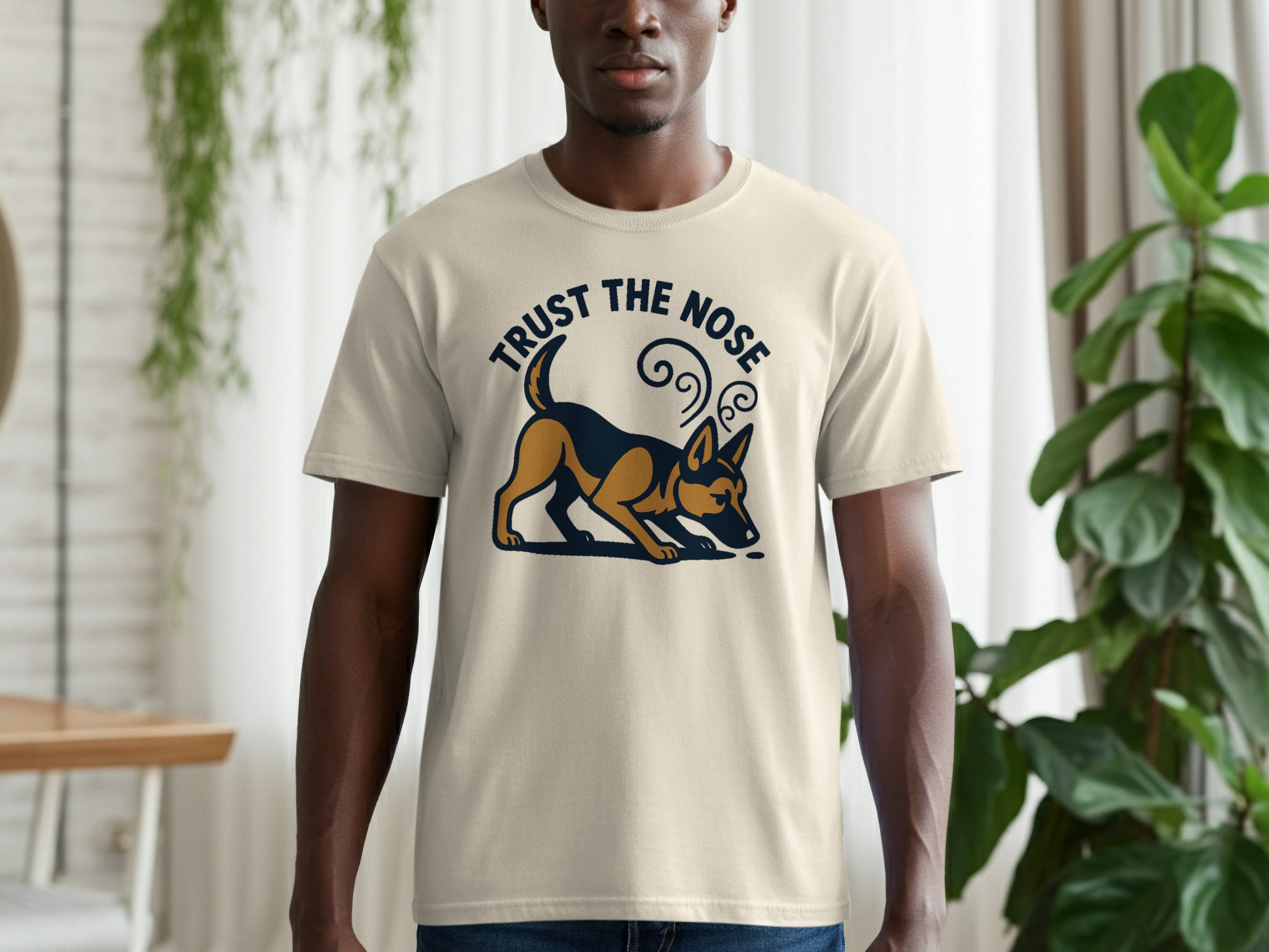 Light beige t-shirt with "TRUST THE NOSE" text and dog graphic.