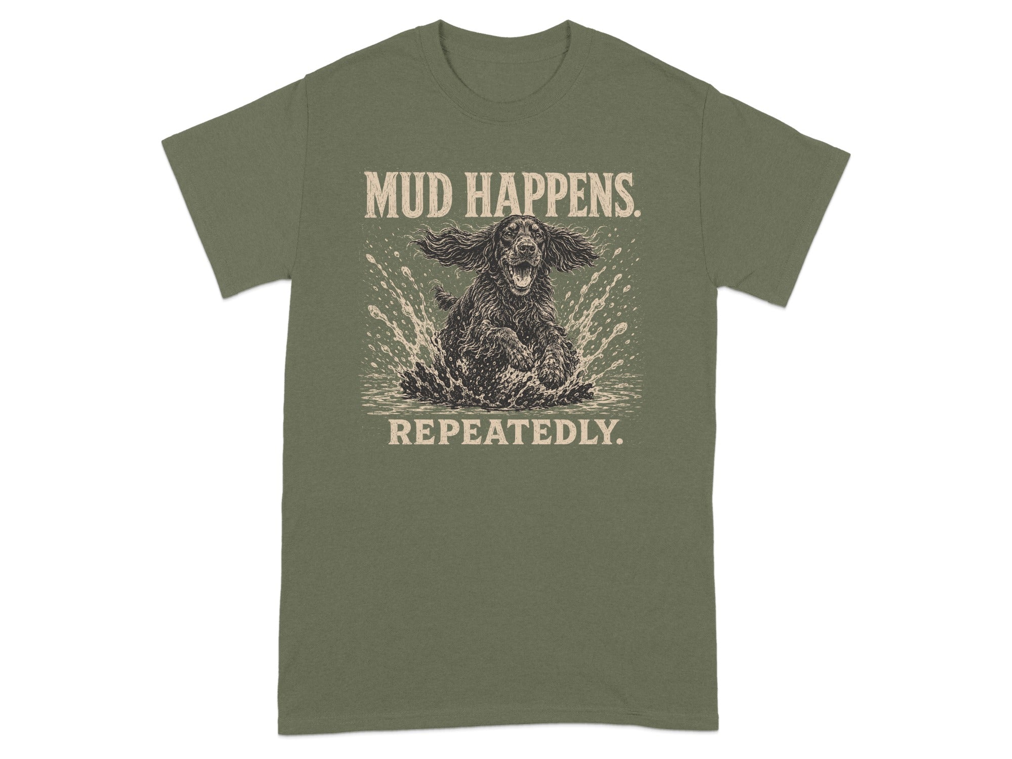 Green t-shirt with a dog splashing in mud and text "MUD HAPPENS. REPEATEDLY."