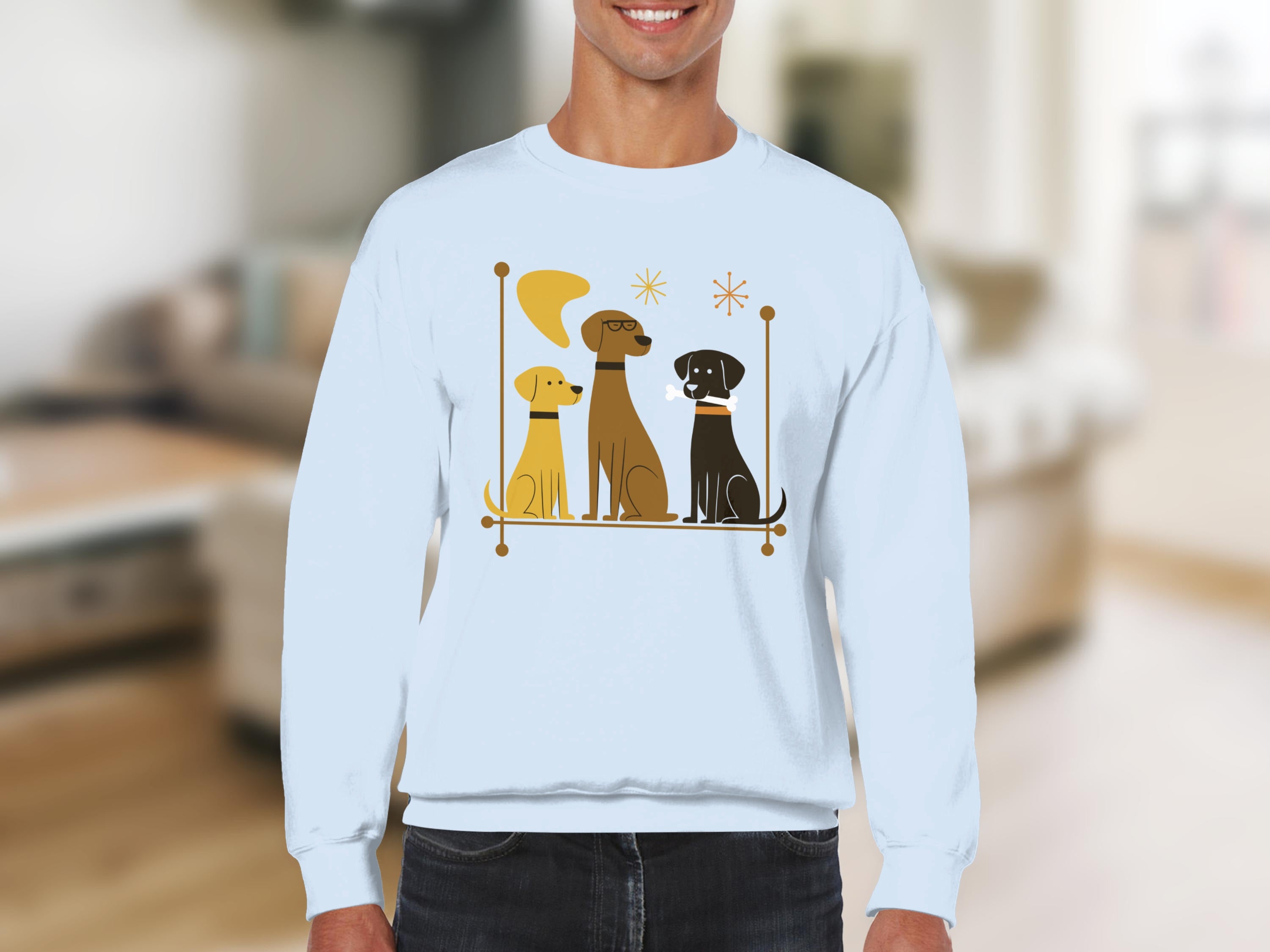Light blue sweatshirt featuring three cartoon dogs in a stylized frame.