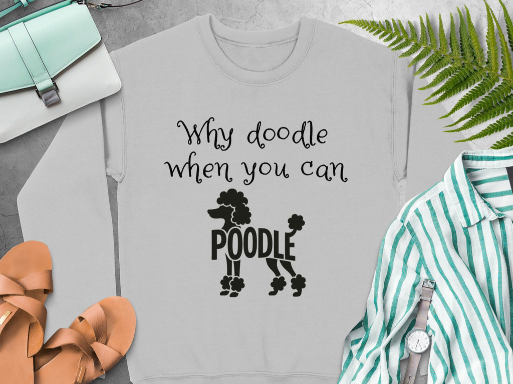 Light grey sweatshirt with "Why doodle when you can Poodle" text and graphic.
