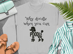 Light grey sweatshirt with "Why doodle when you can Poodle" text and graphic.