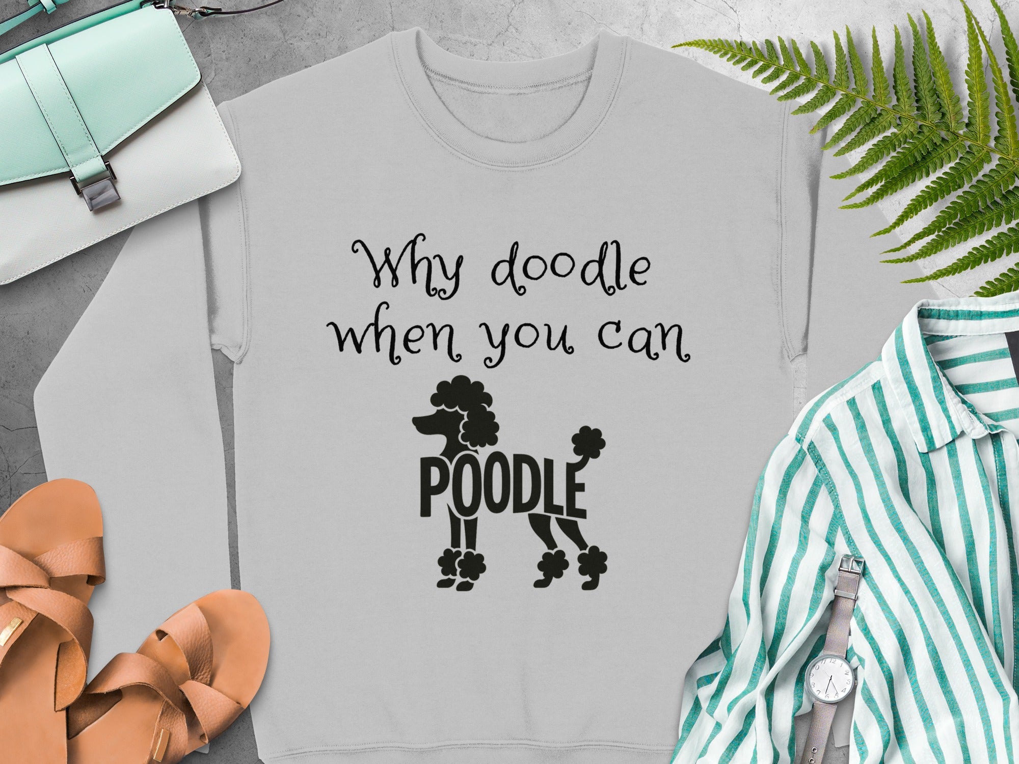 Light grey sweatshirt with "Why doodle when you can Poodle" text and graphic.
