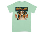 Mint green t-shirt with dog's face and "MENTALLY BUSY SINCE SUNRISE" text.