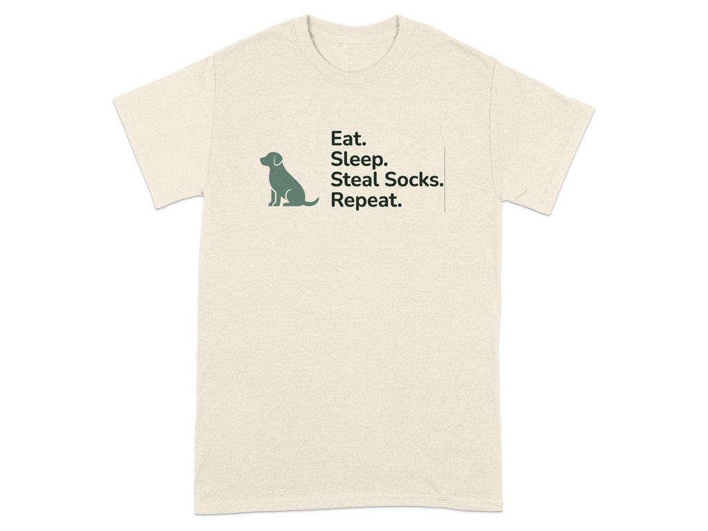 Cream t-shirt with black text: "Eat. Sleep. Steal Socks. Repeat." and a small dog silhouette.