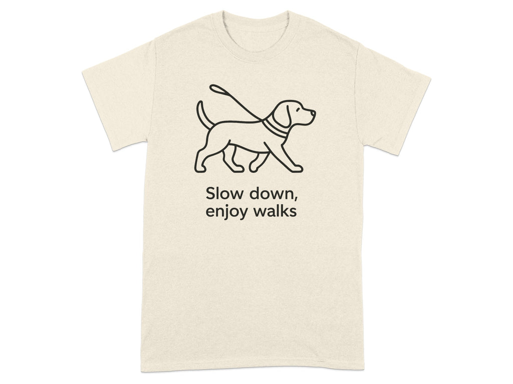 T-shirt with black line drawing of a dog on a leash and text "Slow down, enjoy walks".