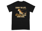 Black t-shirt with text "SORRY I'M LATE. MY BEAGLE FOUND SOMETHING." and a beagle on a leash.