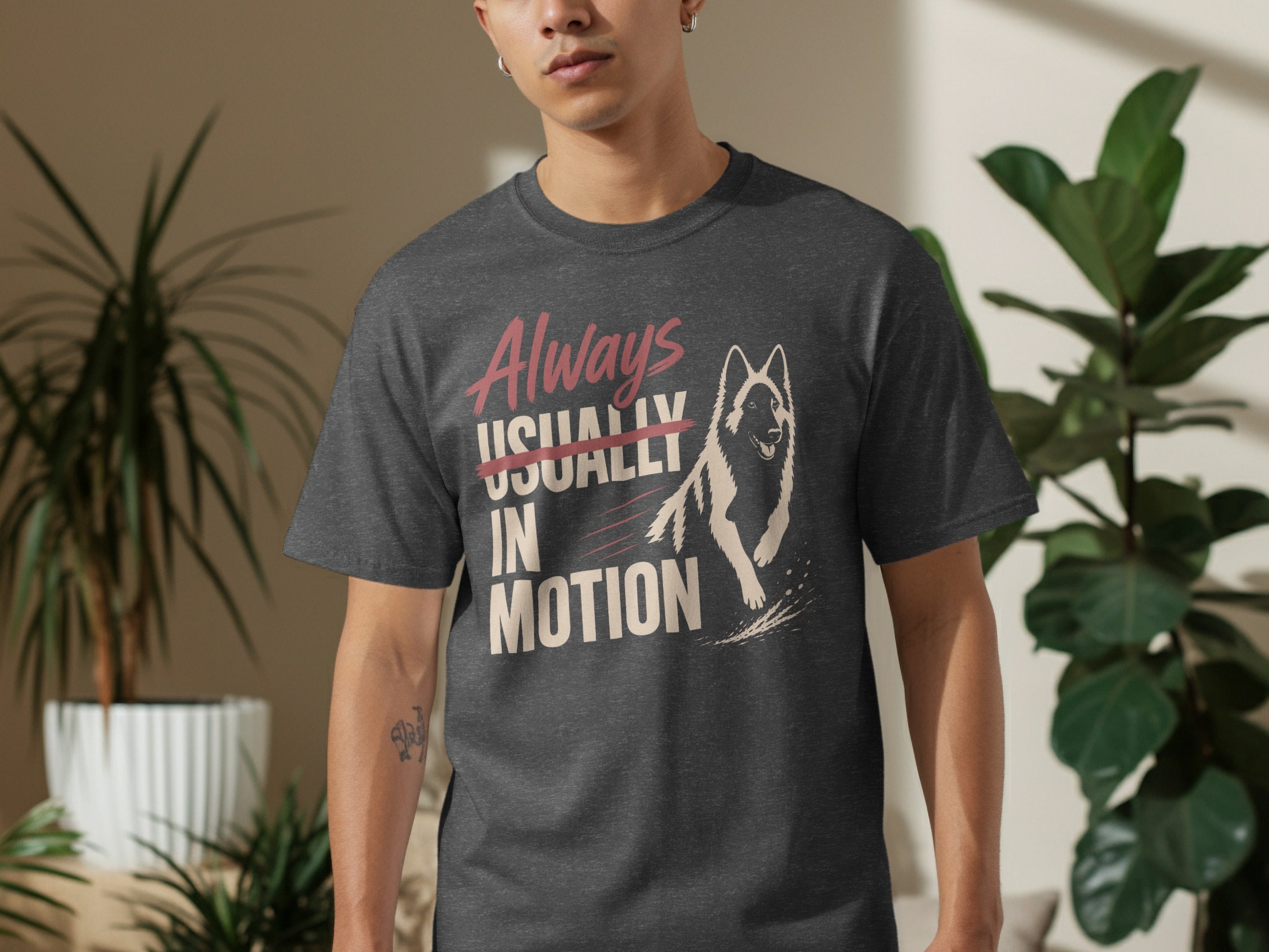 Gray t-shirt with "Always Usually In Motion" text and wolf graphic.