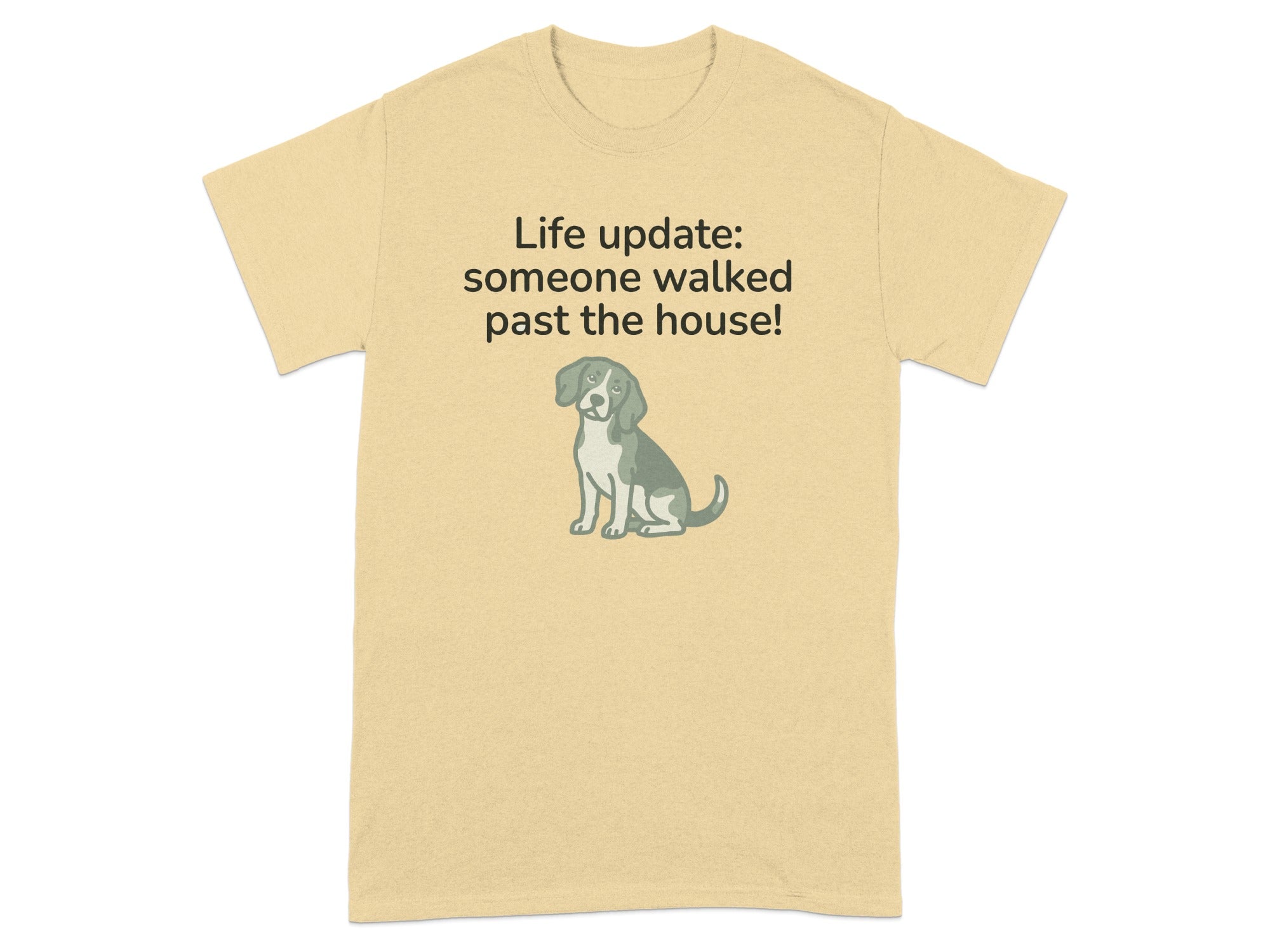 Beige t-shirt with a dog and text reading "Life update: someone walked past the house!".