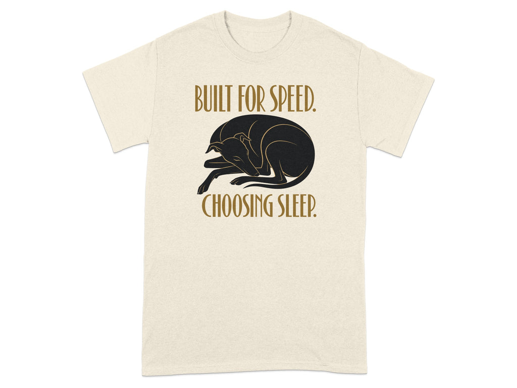 Cream t-shirt with a sleeping black greyhound and "BUILT FOR SPEED. CHOOSING SLEEP." text.