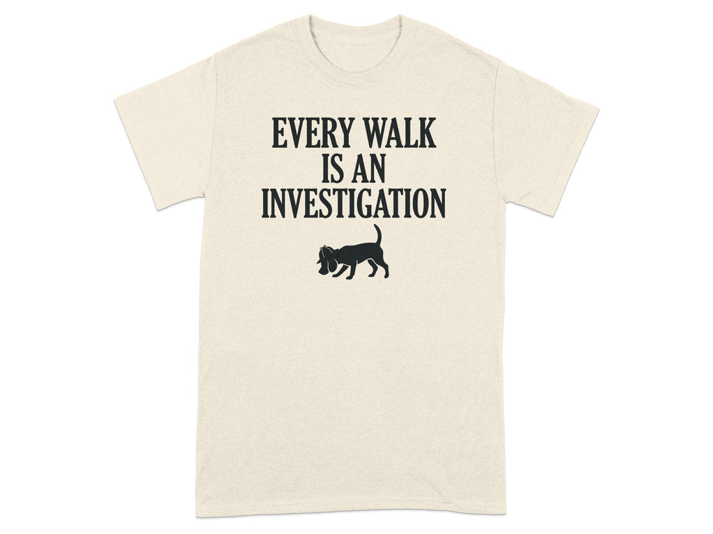 T-shirt with "Every Walk is an Investigation" text and a dog silhouette.