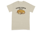 Beige t-shirt with "GOOD VIBES ONLY" above a sleeping dog graphic.