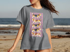 Grey t-shirt with a repeated beagle pattern on pink stripes.