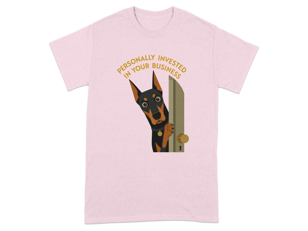 Pink t-shirt with a Doberman peeking through a doorway saying "Personally Invested In Your Business".