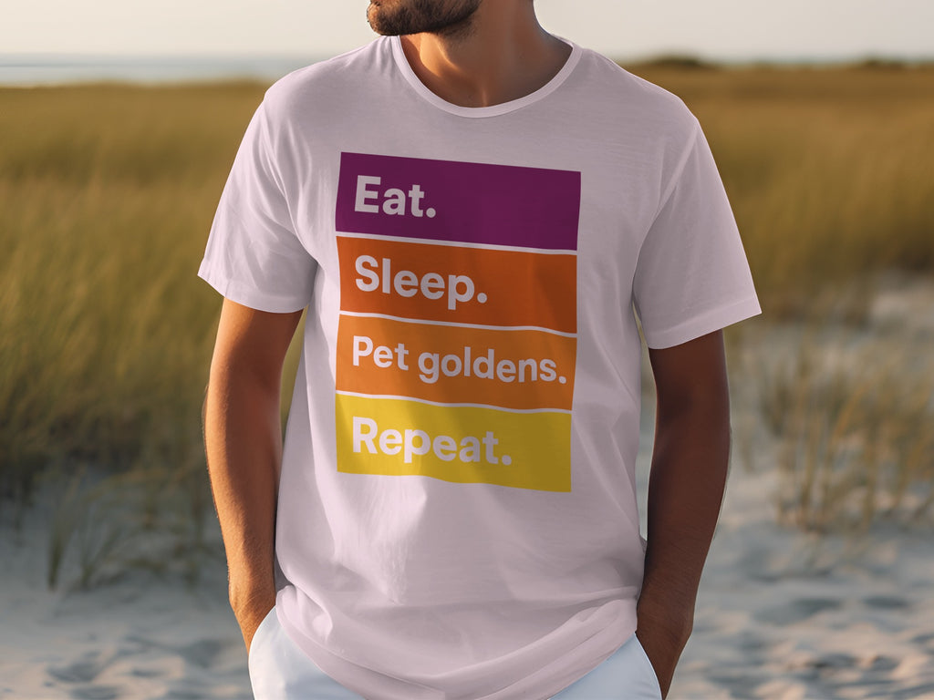 White t-shirt with "Eat. Sleep. Pet goldens. Repeat." text.