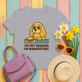 Cocker Not Begging Manifesting Tee in Athletic Heather