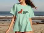 Light mint t-shirt with brown dachshund graphic and text "Sorry I Can't. My Dachshund Said No."